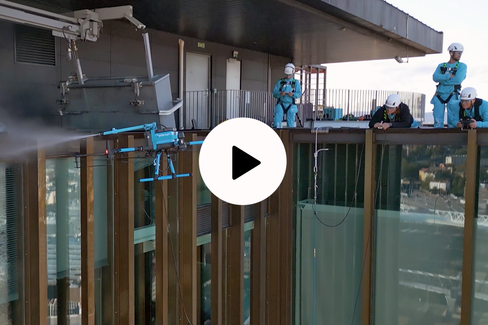 Drone cleaning building